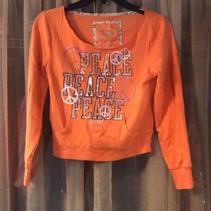 Gently used- Girls orange long sleeve shirt sz 12